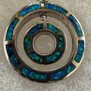 Beautiful sterling silver opal earring and pendant set.